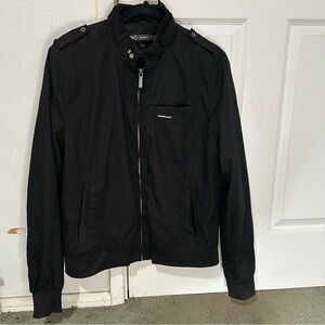 black zip up sweater.